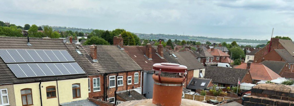 This is a photo taken from a roof which is being repaired by LJ Roofing Walcot, it shows a street of houses, and their roofs